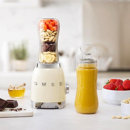 SMEG 50's Retro Style Personal Blender with Backlit Knob and Two 600 ML BPA Free bottles PBF01CRUS Cream