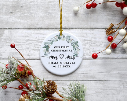 Andaz Press Personalized Our First Christmas As Mrs. & Mrs. Christmas Ornaments 2025 Foliage Wreath 2.8" Round Porcelain Ceramic Lesbian Christmas Ornament Married Couple Gay Women Newlyweds 1-Pack
